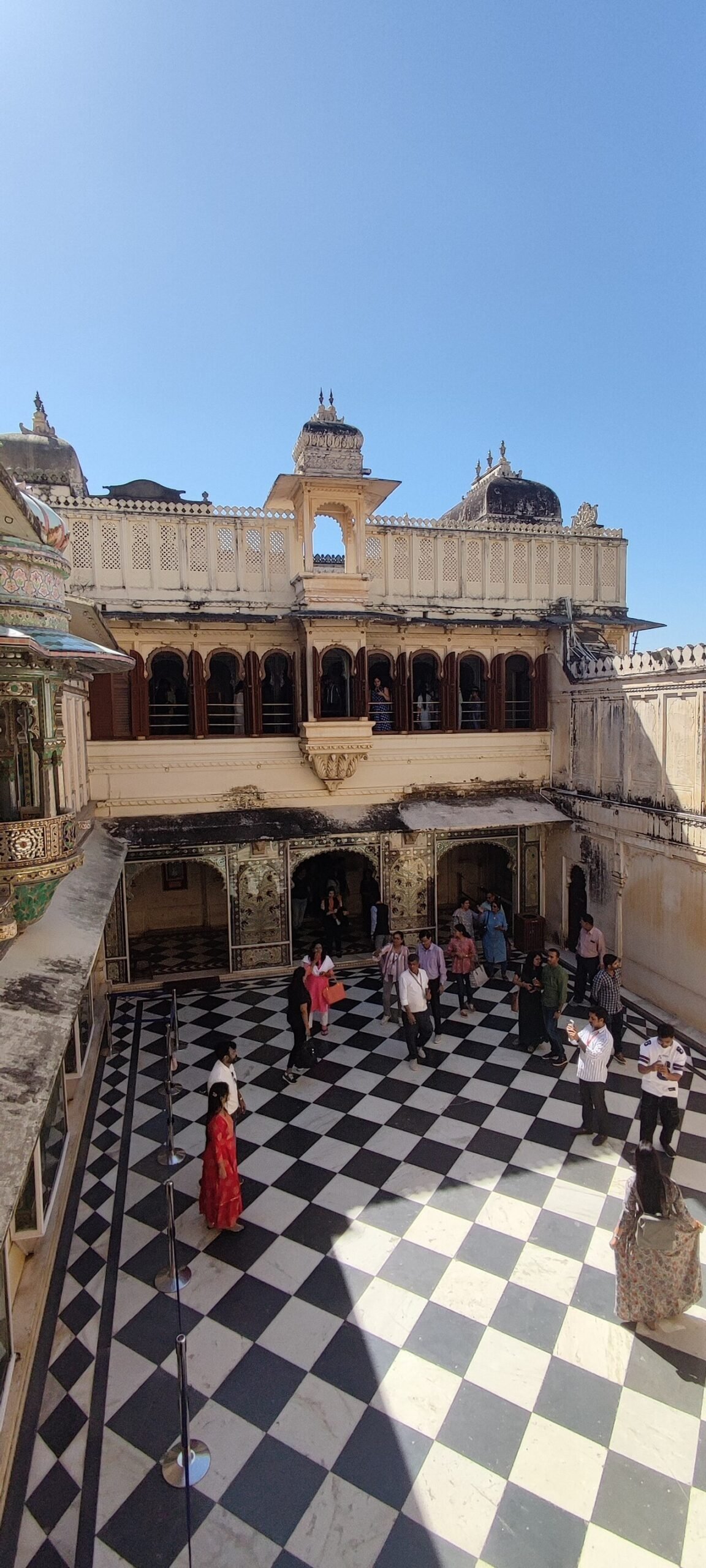 Courtyard with visitors inside the City Palace in Udaipur