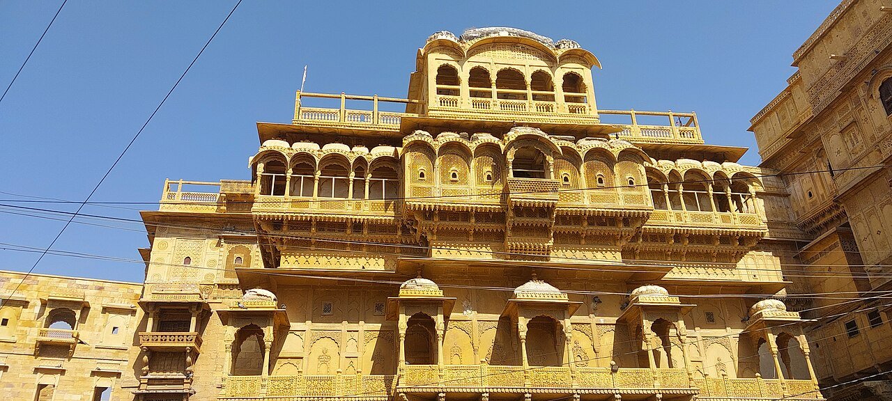 Sandstone haveli facade with carved balconies in Jaisalmer Fort