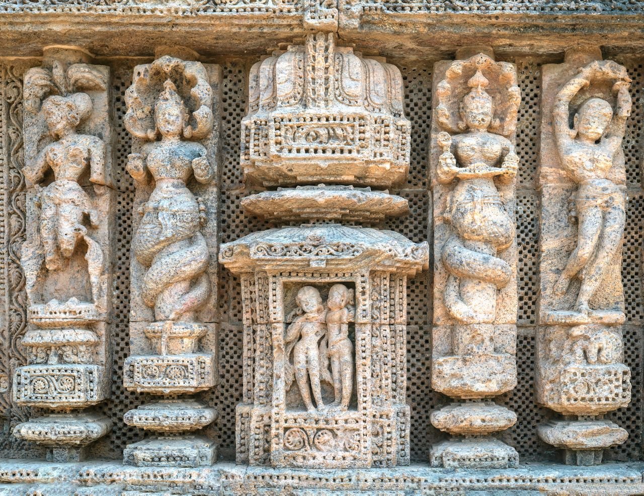 13th-century stone carvings on the walls of the Konark Sun Temple in Puri district, Odisha