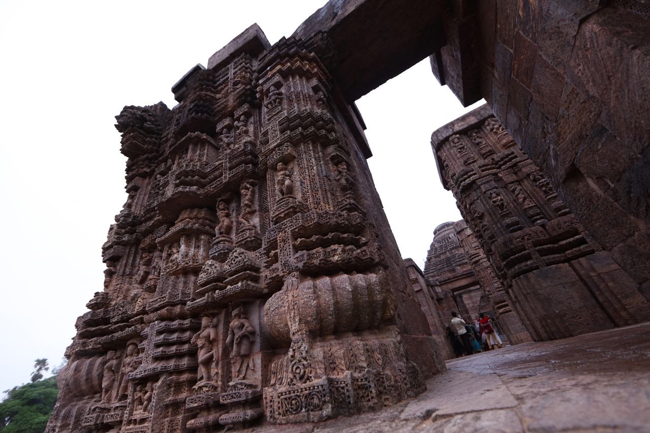 Konark Sun Temple in Odisha, the stone chariot of the sun god Surya, seen across the grounds