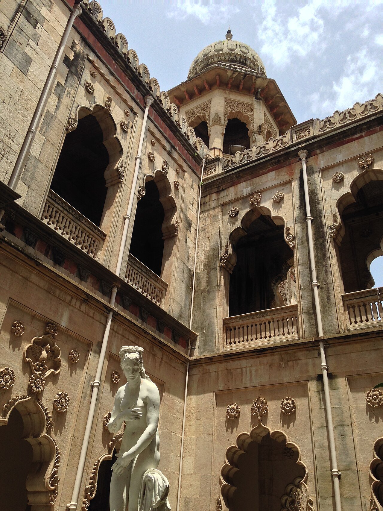 Carved details on a wall of Laxmi Vilas Palace