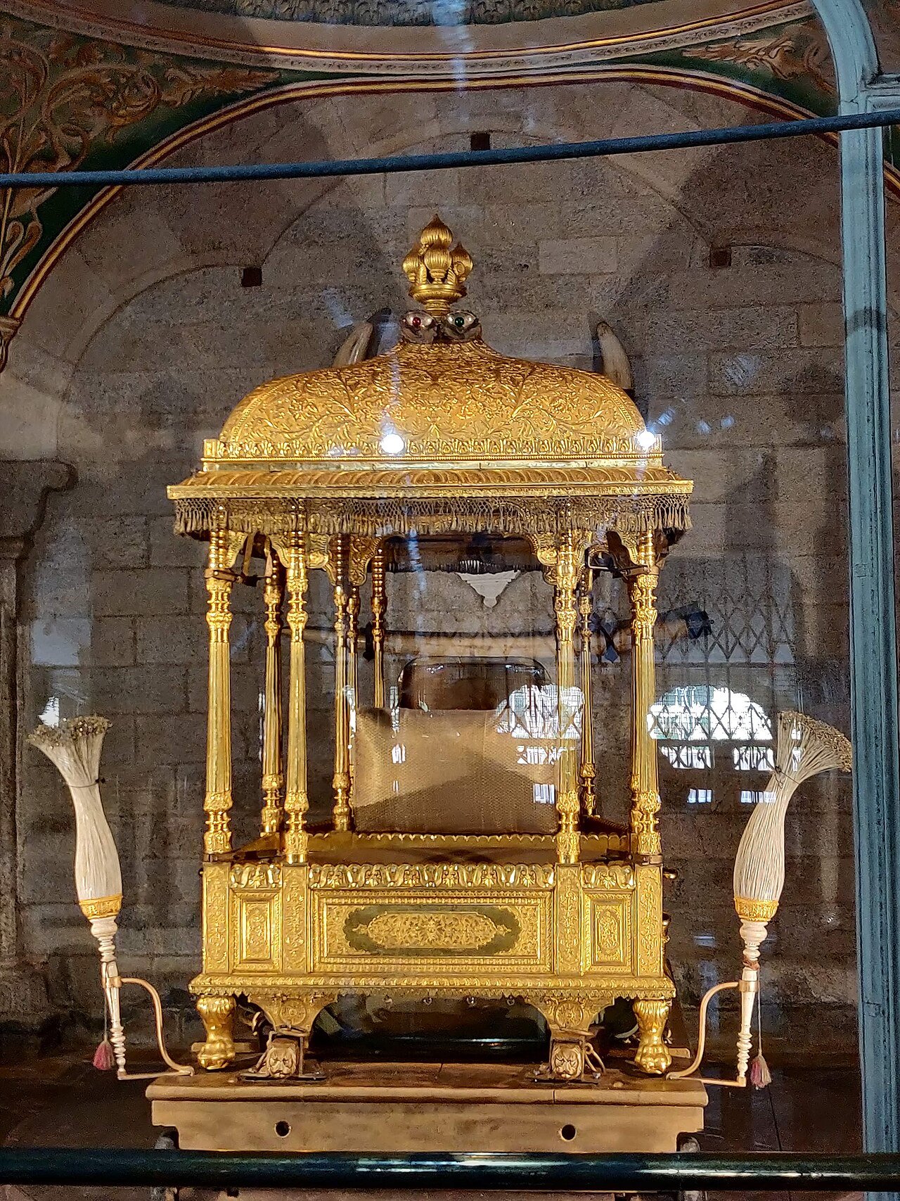 A gilded exhibit displayed inside Mysore Palace