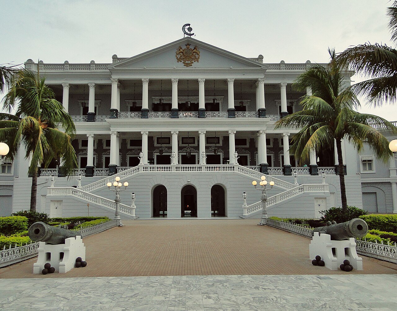 The white façade of Falaknuma Palace in Hyderabad